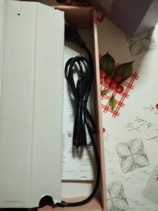 Rizador de pelo automático lila y plateado