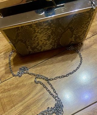 Bolso de mano tipo clutch con estampado de print