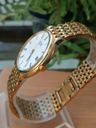 Reloj Citizen Cuarzo Dorado y Blanco