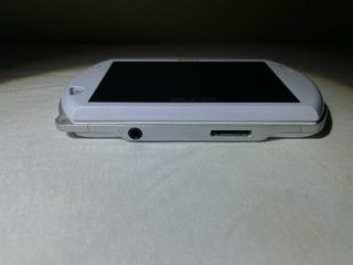 PSP Go Blanca + Cargador + Funda