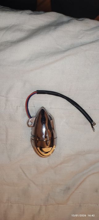 Faro de moto cromado. No homologado.
