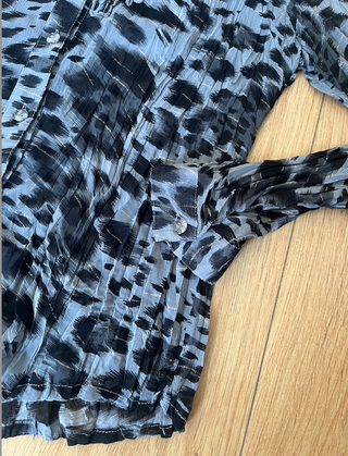 Blusa leopardo gris manga larga