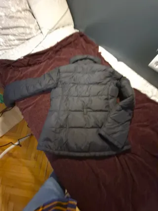 Plumifero corto negro