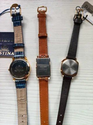 Lote 3 relojes: Festina, Pulsar, titan