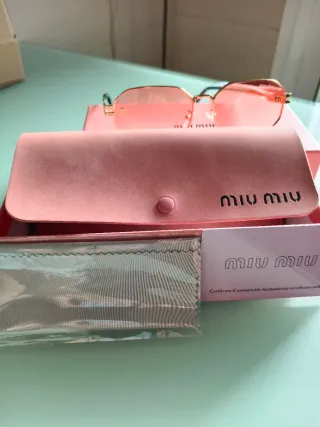Gafas de sol Miu Miu doradas y rosas