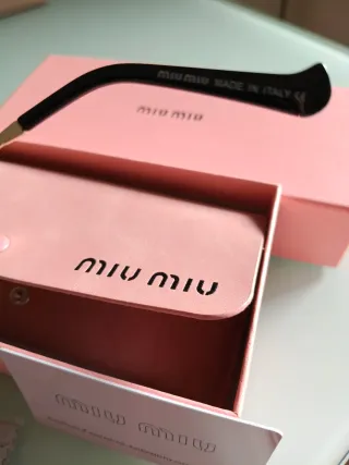 Gafas de sol Miu Miu doradas y rosas