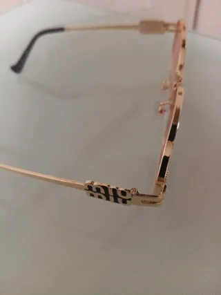 Gafas de sol Miu Miu doradas y rosas