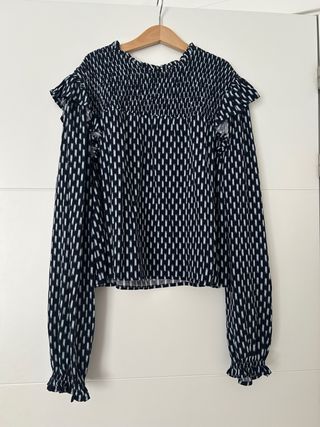 Blusa estampada con volantes