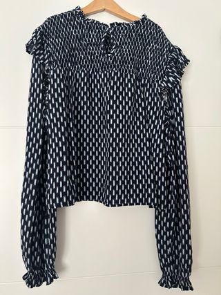 Blusa estampada con volantes