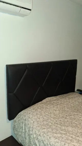 Cabecero de piel negro