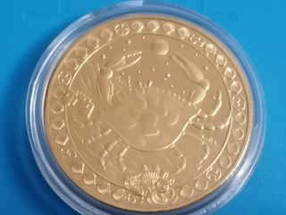 Moneda Cáncer Horóscopo