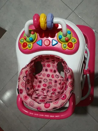 Tacatá rosa con juguetes