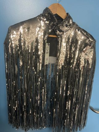 Mini capa fiesta flecos plateada