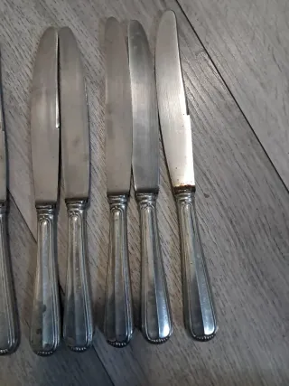 7 Coltelli Manico Argento 800