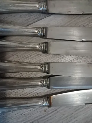 7 Coltelli Manico Argento 800