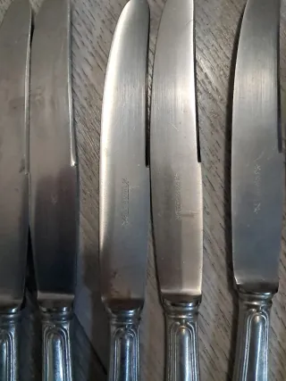 7 Coltelli Manico Argento 800