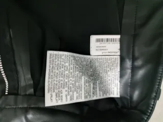 Pantalón negro cuero ancho con pinzas