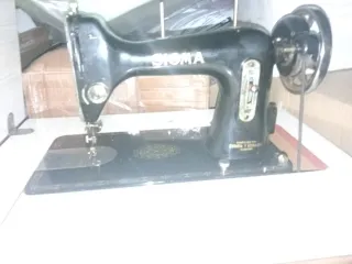 Máquina de coser Sigma antigua