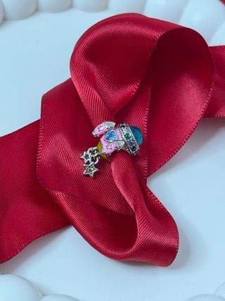 Joyería de plata con dijes