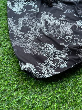 Conjunto de falda y top de dragones