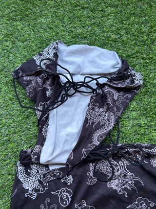 Conjunto de falda y top de dragones