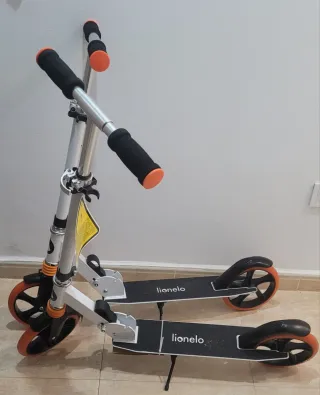 Patinete Luca blanco y naranja nuevo