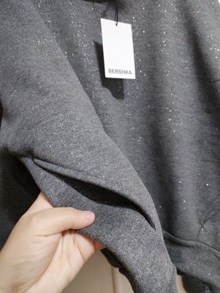 Sudadera capucha purpurina Bershka
