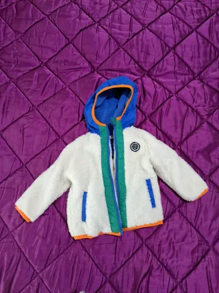 Giubbotto neonato con cappuccio