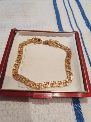 Anillo y pulsera oro 18k con circonita.