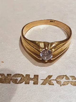 Anillo y pulsera oro 18k con circonita.