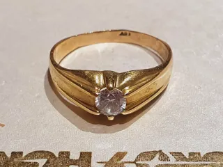 Anillo y pulsera oro 18k con circonita.