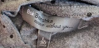 Camisa gris con de cuello, sin mangas