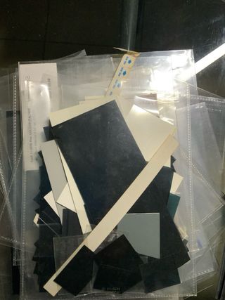 Grande lotto di materiale filatelico con bustine,