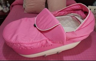 Carrito de bebé rosa