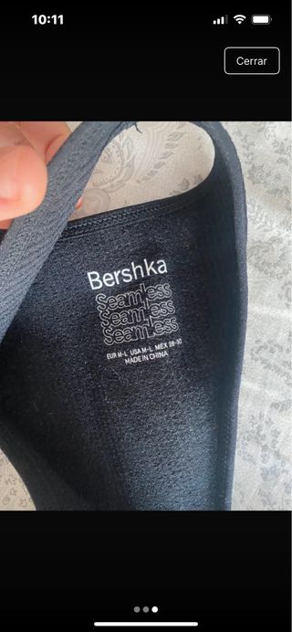 Top Bershka negro asimétrico
