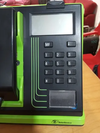 Cabina telefónica Tele-Matrix negra/verde