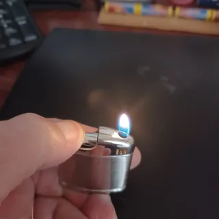 Accendino piezoelettrico cromato