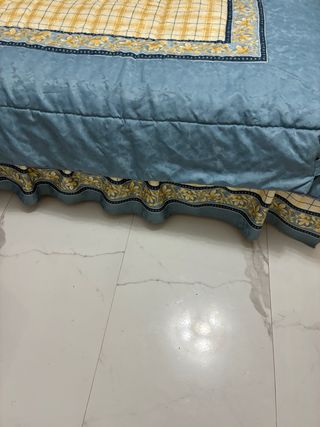 Colcha y edredón con cojines