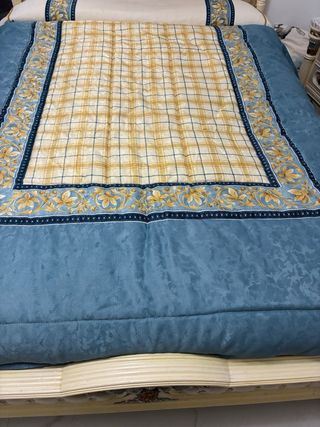 Colcha y edredón con cojines