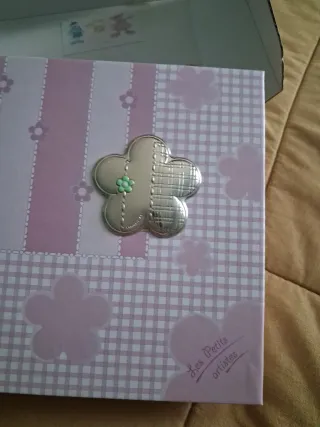 Album portafoto rosa con fiori