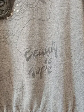 Maglia bambina stampa fiori e profilo