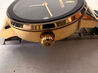 Reloj Invicta Oro y Plata