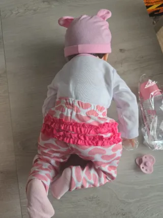 Bambola reborn con vestitino e accessori