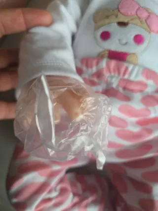 Bambola reborn con vestitino e accessori