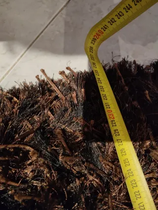 Alfombra Impecable marrón y negra