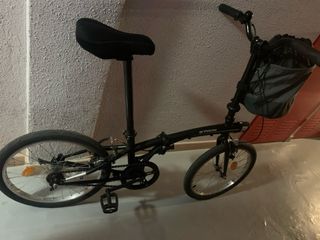 Bicicleta plegable negra sin marchas