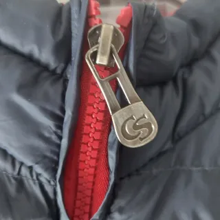Piumino smanicato blu