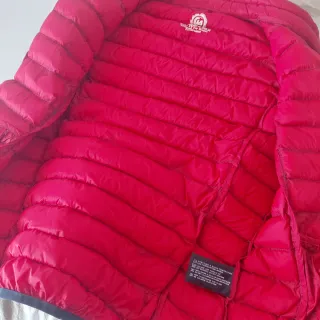 Piumino smanicato blu