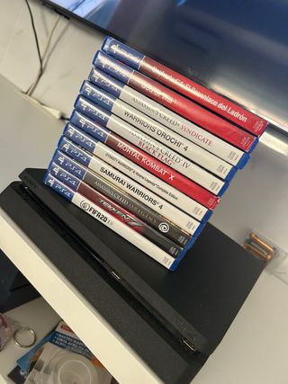 PS4 (PlayStation 4) con 9 juegos