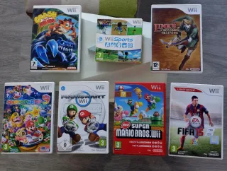 Wii Mini con 7 juegos y un montón de accesorios.